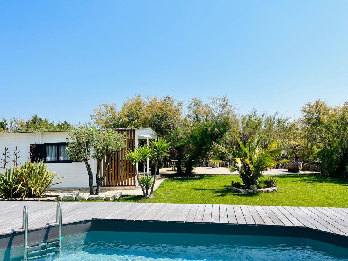 Cabane Le Flamant Avec Jardin, Piscine Et Parking سانت ماري دو لا مير المظهر الخارجي الصورة